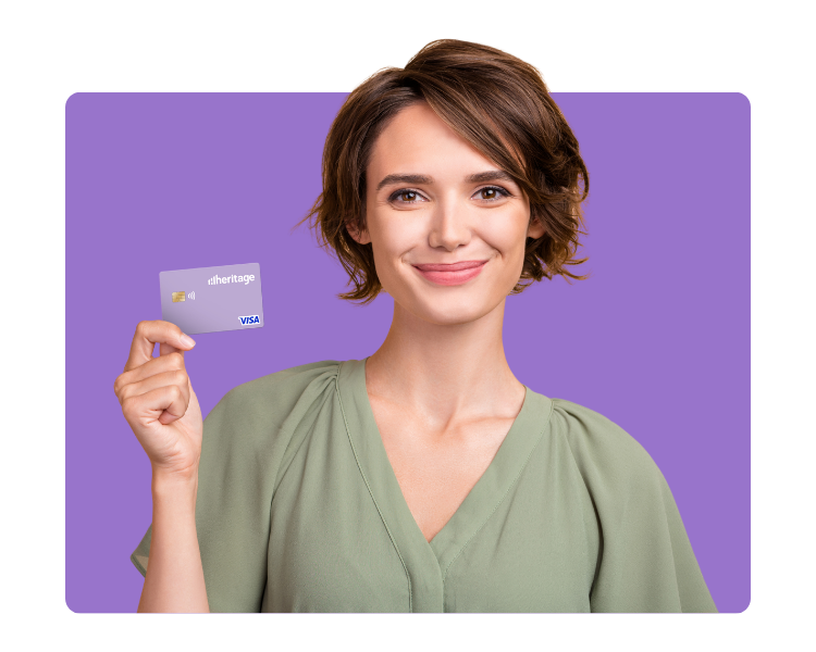 Woman holding purple Heritage card.