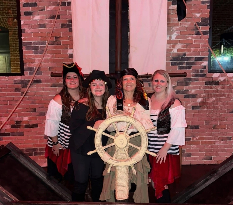 It Takes a Village Staff present their 2025 Heritage Non-Profit of the Year Award at Heritage's 2025 Non-Profit Celebration, A Night of Hidden Treasure.